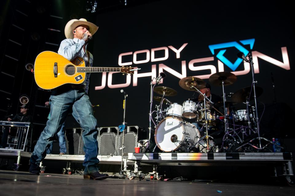 Cody Johnson opens for Luke Combs at Empower Field at Mile High in Denver. Johnson supported Zac Brown Band at a one-night gig inside Boston's Fenway Park.