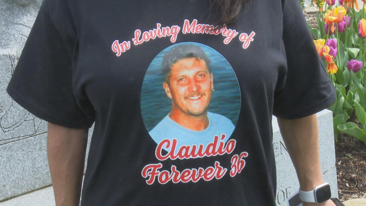 A T-shirt worn by members of the Cardoso family in recognition of Claudio Cardoso, who died in a Windsor workplace accident in 2009. (Dalson Chen/CBC - image credit)