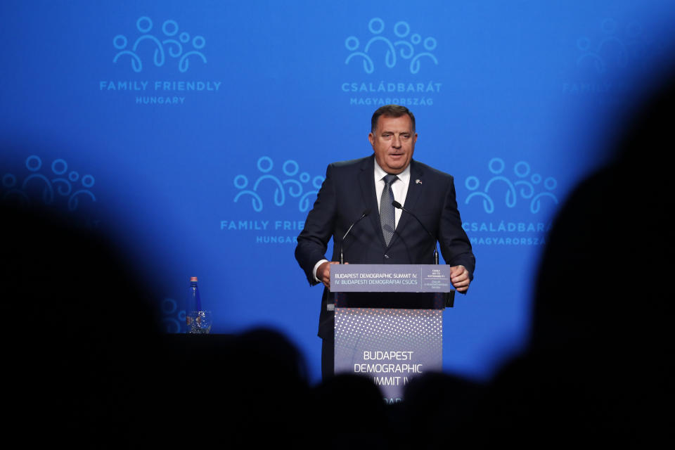 Bosnian Serb member of the tripartite Presidency of Bosnia Milorad Dodik holds a speech during the 4th Budapest Demographic Summit in Budapest, Hungary, Thursday, Sept. 23, 2021. The biannual demographic summit, which was first organized in 2015, offers a forum for "pro-family thinker" decision-makers, scientists, researchers, and church representatives of the same sort to exchange their thoughts about connections between demographics and sustainability. (AP Photo/Laszlo Balogh)