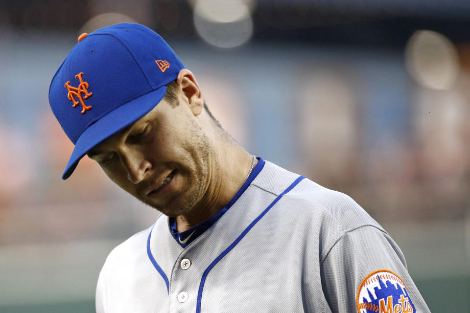 New York Mets starting pitcher Jacob deGrom walks off the field after the first inning of the team's baseball game against the Washington Nationals, Tuesday, Sept. 3, 2019, in Washington. Washington scored a run against deGrom in the first. (AP Photo/Patrick Semansky)