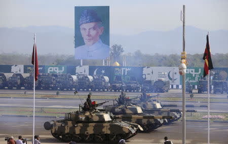 FILE PHOTO: Pakistani armed forces in tanks take part during the Pakistan Day military parade in Islamabad, Pakistan, March 23, 2016. REUTERS/Faisal Mahmood/File Photo