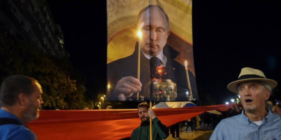 Supporters of Putin with his portrait in Belgrade, Serbia