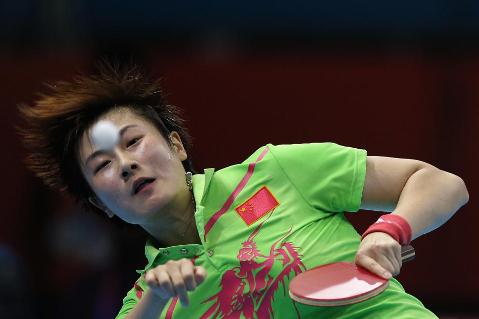 Day 4: Ning Ding of China completes against Tianwei Feng of Singapore during the Women's Singles Table Tennis semi-final match on Day 4 of the London 2012 Olympic Games at ExCeL on July 31, 2012 in London, England. (Getty Images)