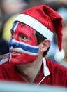 A Norway fan in a Santa hat with the national flag painted on his face during the 2019 FIFA Women's World Cup France group A match between Norway and Nigeria at Stade Auguste Delaune on June 8, 2019 in Reims, France. (Photo by Charlotte Wilson/Offside/Getty Images)