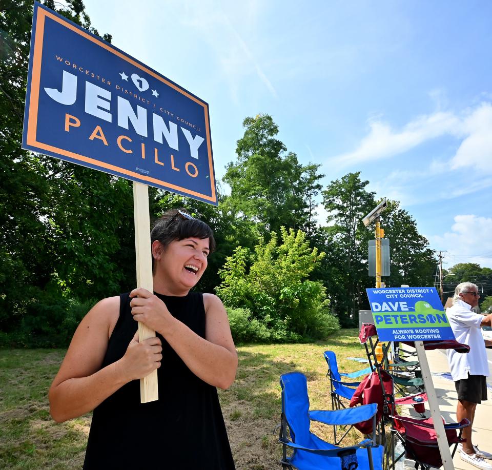 District 1 City Council candidate Jenny Pacillo campaigns across the street from the Univeralist Unitarian Church on Holden Street on Tuesday.