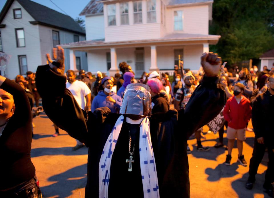 Hundreds of demonstrators, including Rev. Raymond Johnson, take to the streets in Elizabeth City, N.C. on Monday, April 26, 2021, to protest the killing of Andrew Brown Jr. by North Carolina sheriff's deputies and to demand the full body camera footage be released.