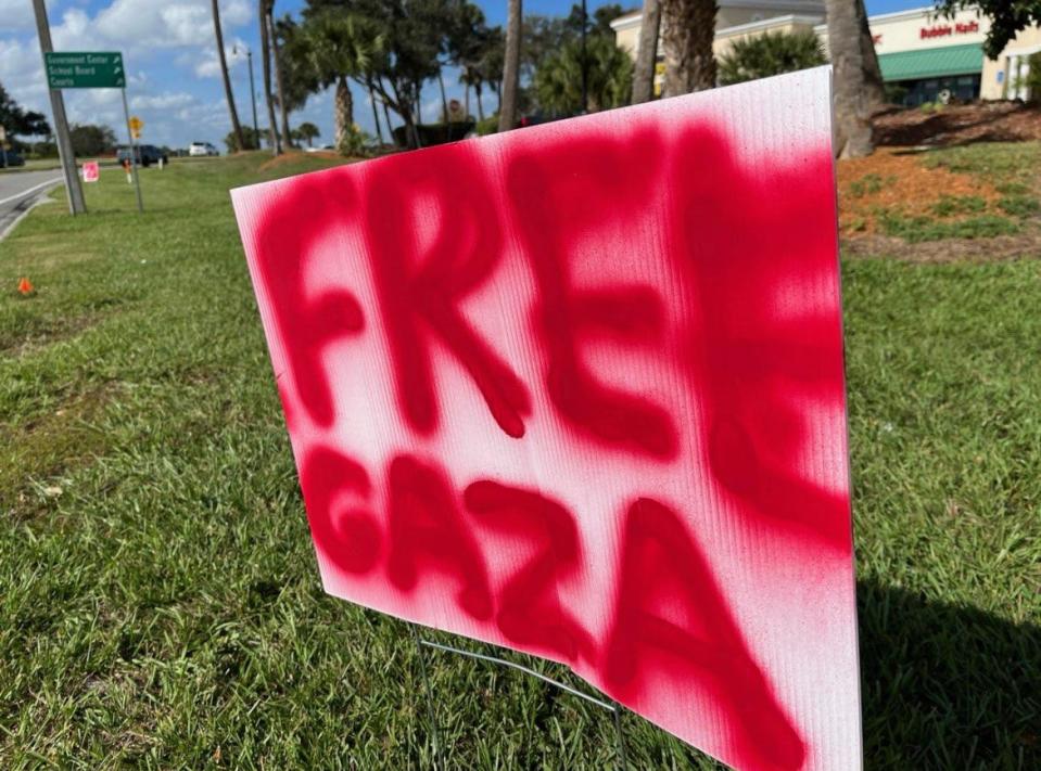 The back of an "Israel Unity" sign was vandalized with the words "Free Gaza" Sunday, before an annual Hanukkah celebration.