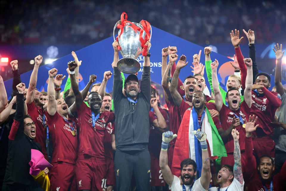 Jurgen Klopp lifts the Champions League trophy (Photo by Michael Regan/Getty Images)