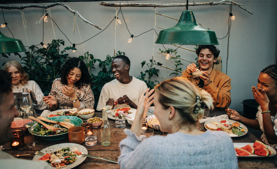 Coworkers having dinner together