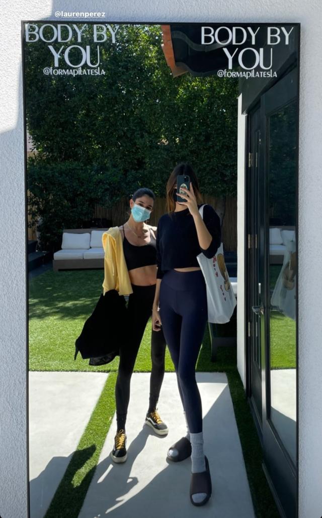 Kendall Jenner steps out in blue leggings from Alo Yoga: Shop her
