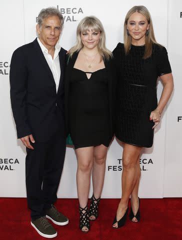 <p>Rob Kim/Getty Images for Tribeca Festival</p> Ben Stiller and Christine Taylor surround their daughter Ella Stiller in June 2023 at the Tribeca Festival's 'Let Live' screening in New York City.