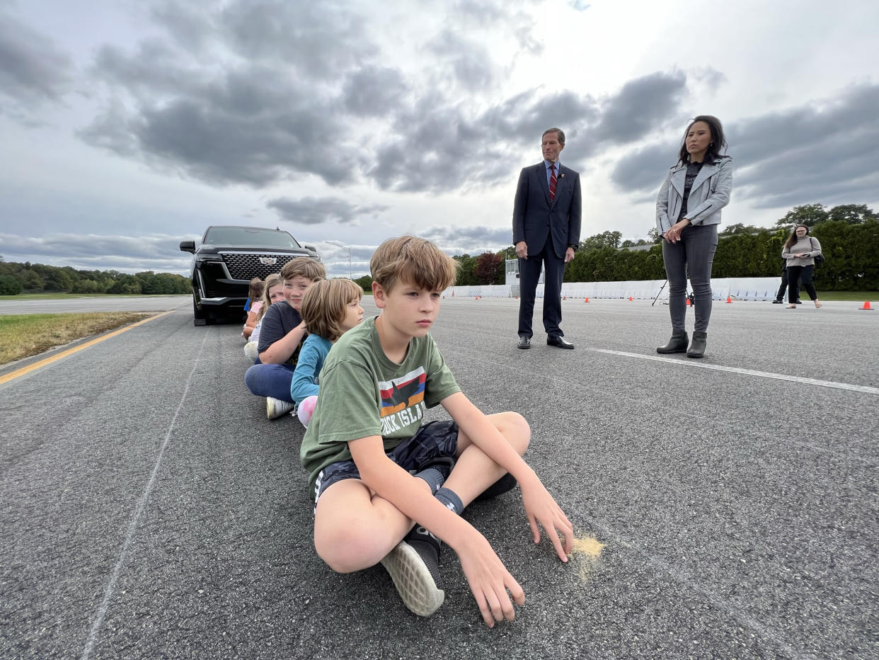 A group of elementary school children sit during a SUV visibility test conducted by NBC News. (Jean Lee / NBC News)