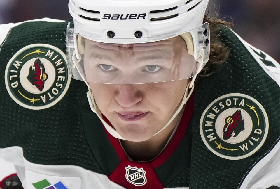 Minnesota Wild's Kirill Kaprizov waits for a faceoff against the Vancouver Canucks during the third period of an NHL hockey game Thursday, March 2, 2023, in Vancouver, British Columbia. (Darryl Dyck/The Canadian Press via AP)