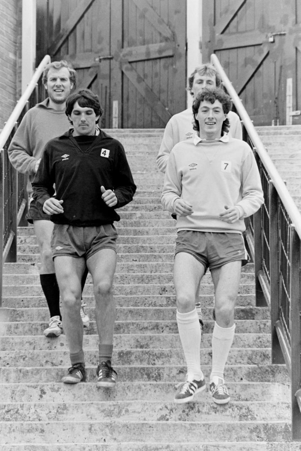 Watford Observer: Jan Lohman and David Bardsley take a jog down the terrace steps