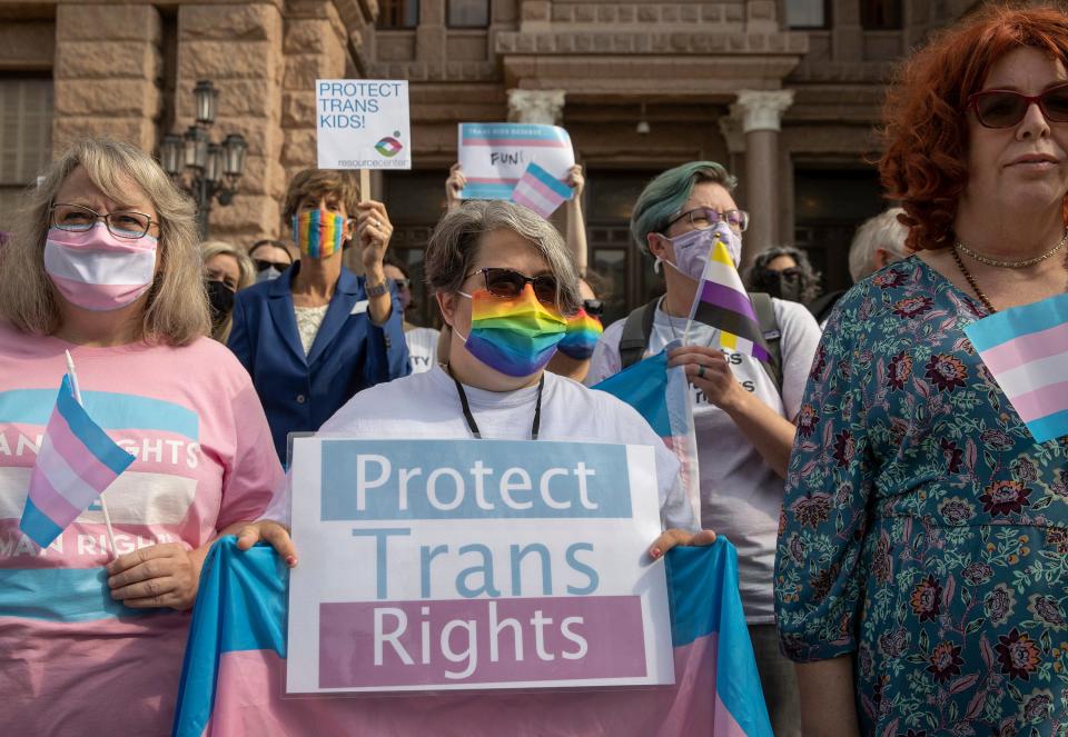 A rally at the Capitol in Austin, Texas, denounces a bill that bans transgender students from playing on school sports teams that align with their gender identities.