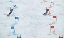 Alpine Skiing - Pyeongchang 2018 Winter Olympics - Team Event - Yongpyong Alpine Centre - Pyeongchang, South Korea - February 24, 2018 - Nina Haver-Loeseth of Norway (L) and Adeline Baud Mugnier of France compete. REUTERS/Mike Segar