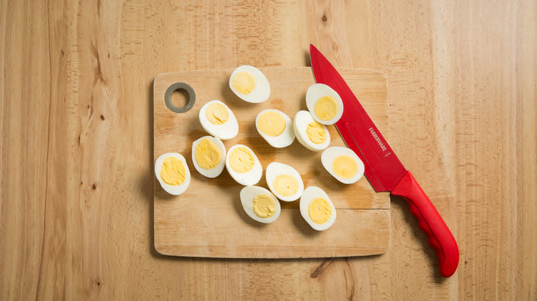 halved boiled eggs on table