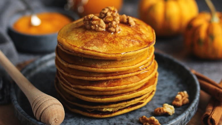 Pumpkin pancakes and puree in dish