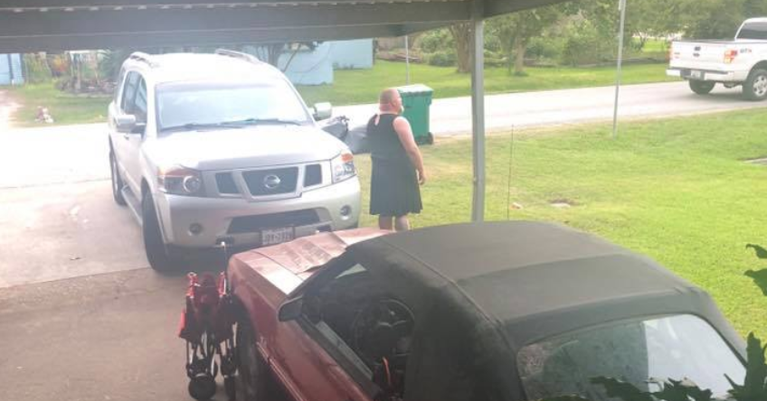 A father walked his son to the bus wearing a black dress after the son was rude to his mother. (Photo: Joseph Blakeney via Facebook)