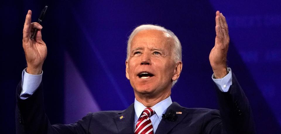 Biden has used the "but it will raise taxes" jab against his fellow Democratic candidates' proposals. (Photo: Mike Blake / Reuters)