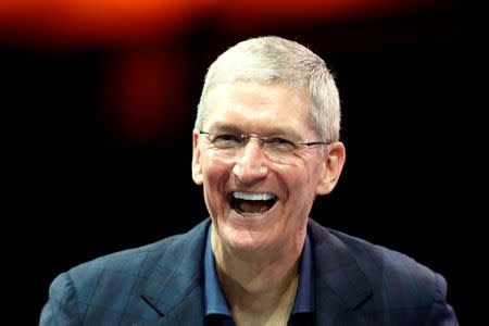 Apple CEO Tim Cook speaks at the WSJD Live conference in Laguna Beach, California October 27, 2014. REUTERS/Lucy Nicholson/Files