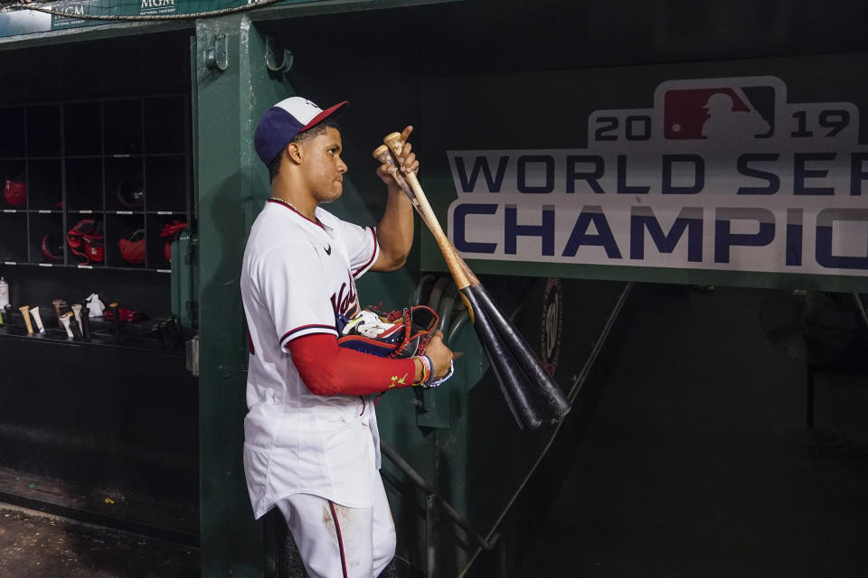 Washington Nationals' Juan Soto heads to the clubhouse after a baseball game against the New York Mets at Nationals Park, Monday, Aug. 1, 2022, in Washington. (AP Photo/Alex Brandon)