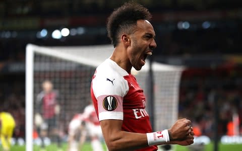  Arsenal's Pierre-Emerick Aubameyang celebrates his side's first goal of the game, which was an own goal by FC BATE Borisov's Zakhar Volkov (not pictured) during the UEFA Europa League round of 32 second leg match at the Emirates Stadium, London - Credit: PA