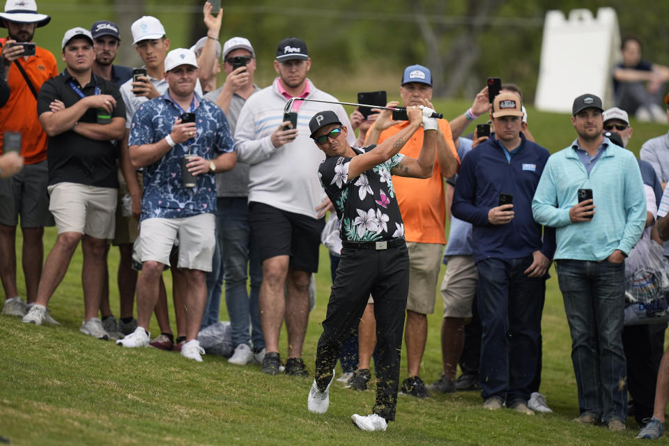 Rickie Fowler hits from the rough on the second hole during the first round of the Dell Technologies Match Play Championship golf tournament in Austin, Texas, Wednesday, March 22, 2023. (AP Photo/Eric Gay)