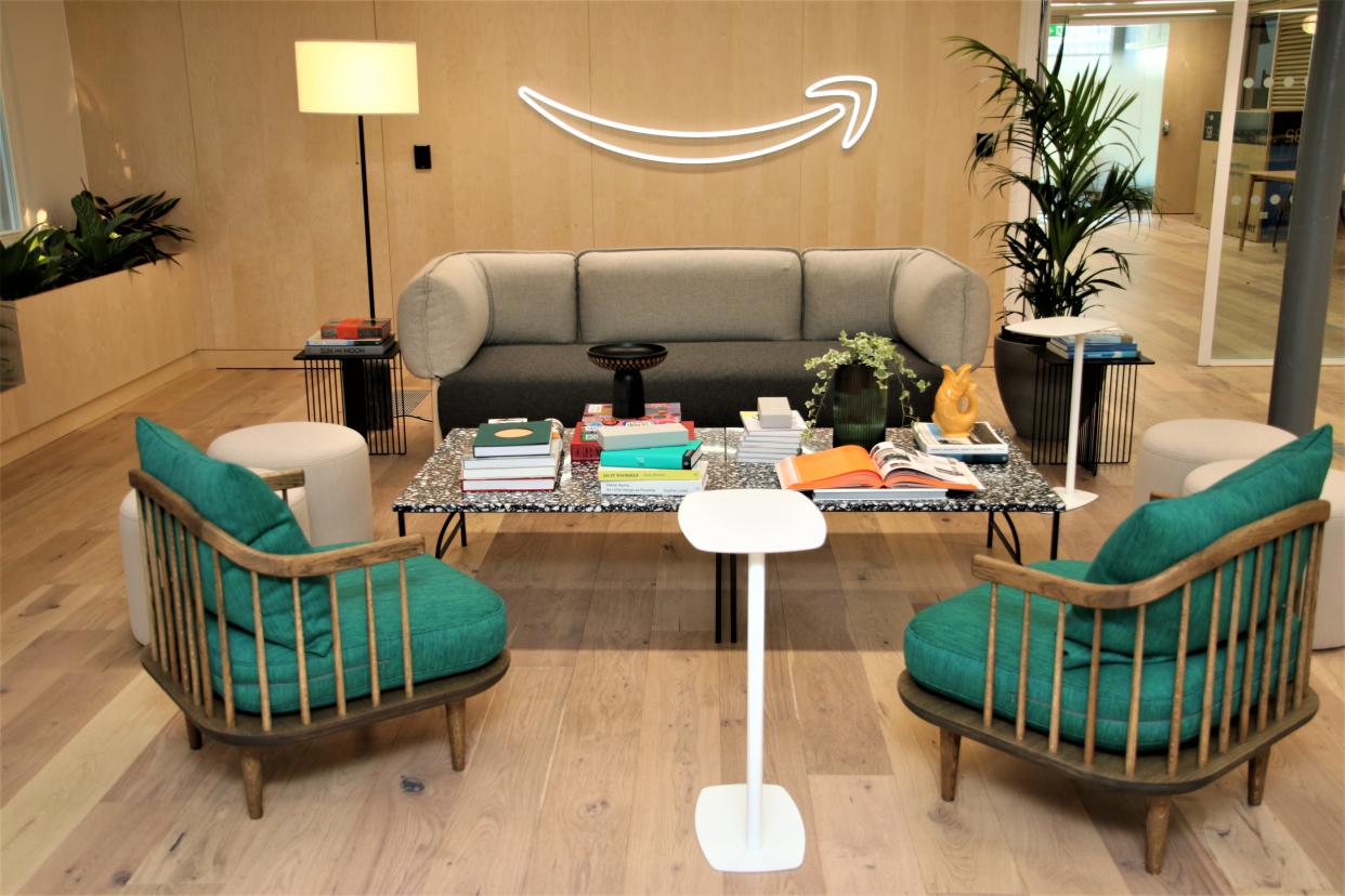 A sofa and chairs in Amazon's Manchester corporate office