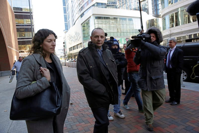 Test administrator Igor Dvorskiy leaves the federal courthouse in Boston