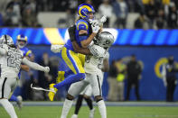 Los Angeles Rams wide receiver Ben Skowronek, above, hauls in a pass as Las Vegas Raiders cornerback Nate Hobbs defends during the second half of an NFL football game Thursday, Dec. 8, 2022, in Inglewood, Calif. (AP Photo/Mark J. Terrill)