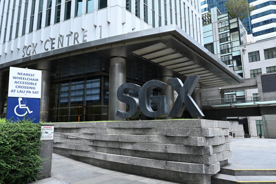 A general view shows the Singapore Exchange (SGX) stock exchange building in the central business district in Singapore on April 7, 2020, as the country ordered the closure of all businesses deemed non-essential as well as schools to combat the spread of the COVID-19 novel coronavirus. - Singapore's usually bustling business district was almost deserted on April 7 as most workplaces in the city-state closed to stem the spread of the coronavirus after a surge in cases. (Photo by Roslan RAHMAN / AFP) (Photo by ROSLAN RAHMAN/AFP via Getty Images)