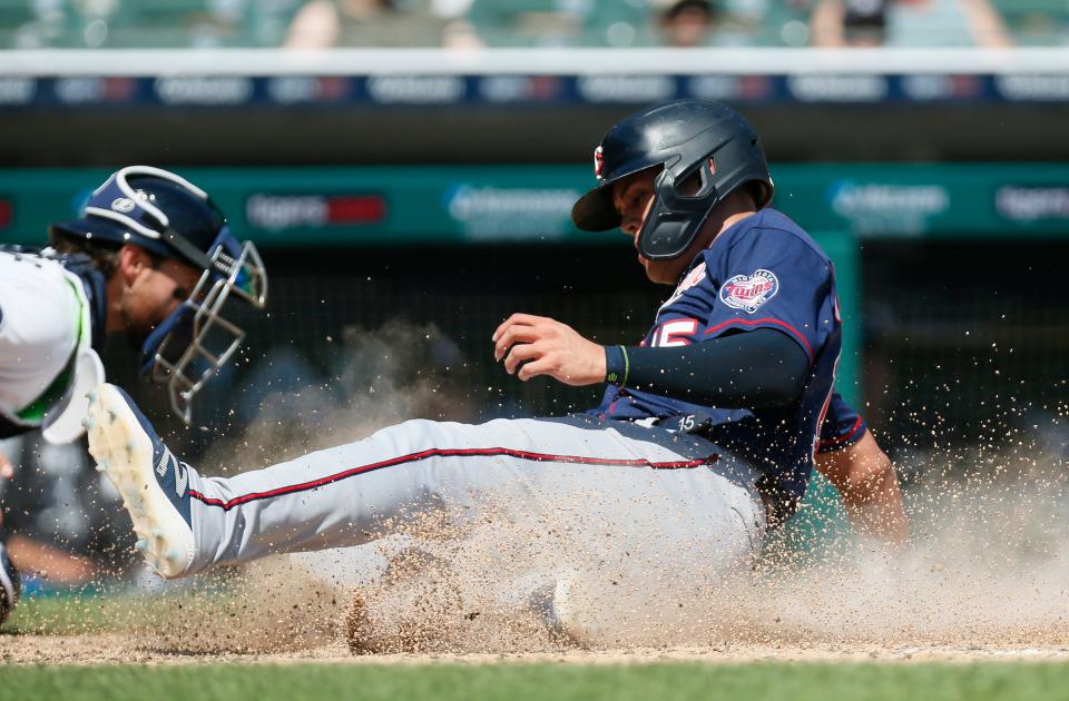 Gio Urshela of the Minnesota Twins scores against the Detroit Tigers on a double hit by Luis Arraez during the seventh inning at Comerica Park in Detroit on Sunday, July 24, 2022.