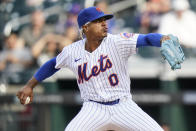New York Mets' Marcus Stroman (0) pitches during the first inning in the first baseball game of a doubleheader against the Miami Marlins, Tuesday, Sept. 28, 2021, in New York. (AP Photo/Frank Franklin II)