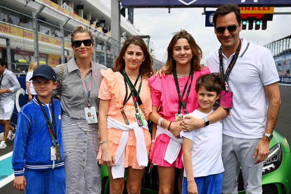 <p>Clive Mason - Formula 1/Formula 1 via Getty </p> Roger Federer poses for a photo with his family prior to the F1 Grand Prix of Miami  in 2023