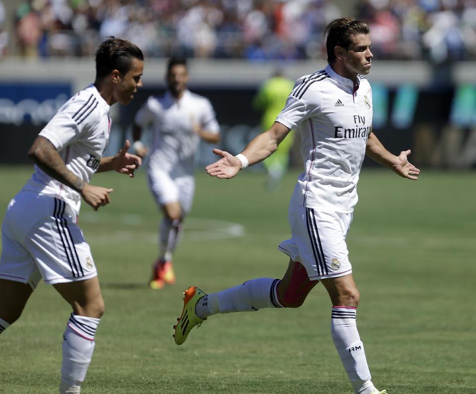 Gareth Bale del Real Madrid celebra tras marcar un gol ante el Inter de Milán en un partido amistoso. (AP Foto/Ben Margot)