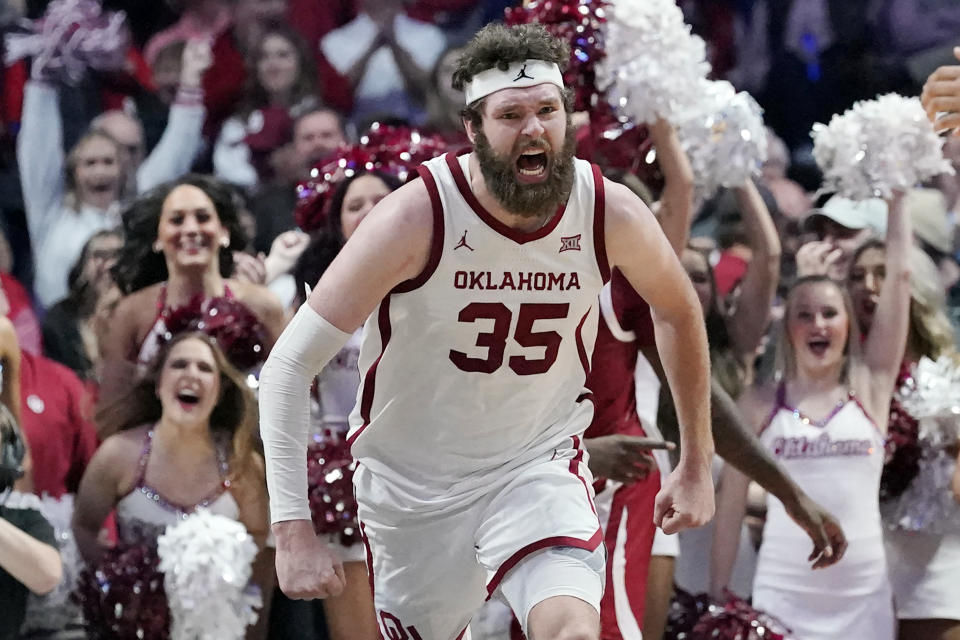 Oklahoma forward Tanner Groves (35) celebrates after a dunk in the second half of an NCAA college basketball game against Arkansas, Saturday, Dec. 11, 2021, in Tulsa, Okla. (AP Photo/Sue Ogrocki)