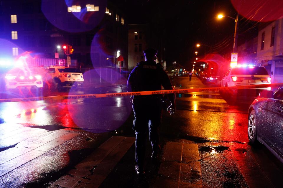 Police investigate the scene of a shooting Monday, July 3, 2023 in Philadelphia.