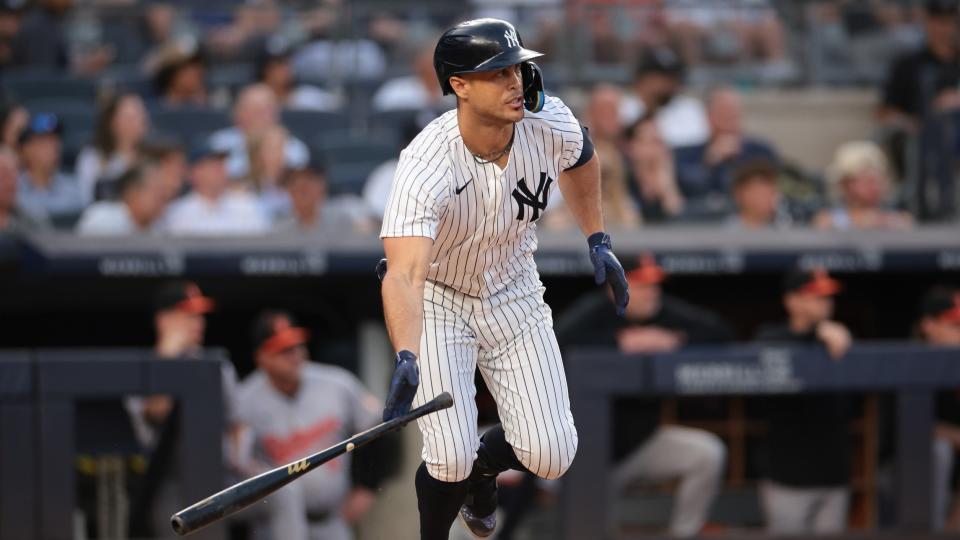 Jun 18, 2024; Bronx, New York, USA; New York Yankees designated hitter Giancarlo Stanton (27) hits an RBI single during the third inning against the Baltimore Orioles at Yankee Stadium.