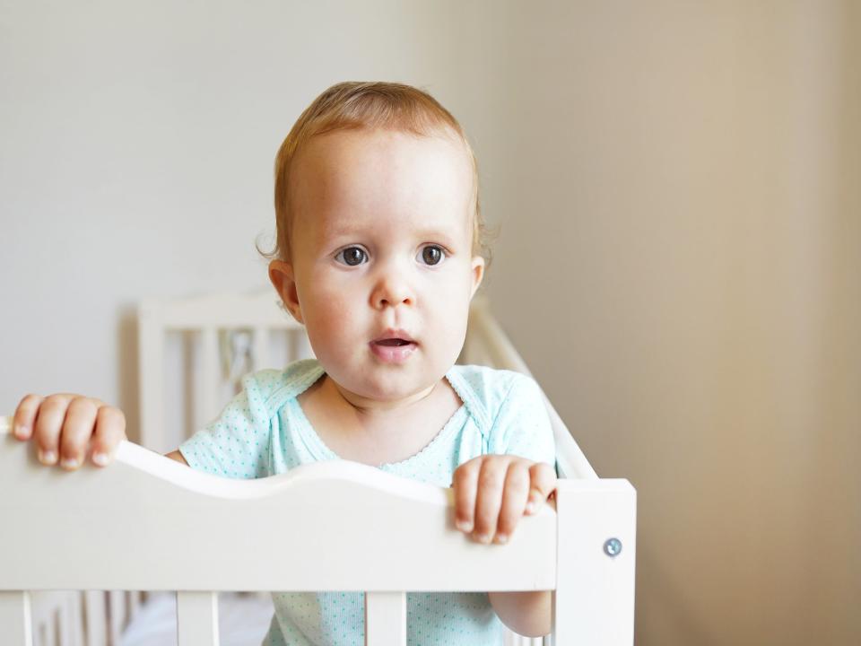 Getting a cotbed will mean your baby can use it for longer. As they get bigger, you can lower the mattress so they can’t climb outiStock