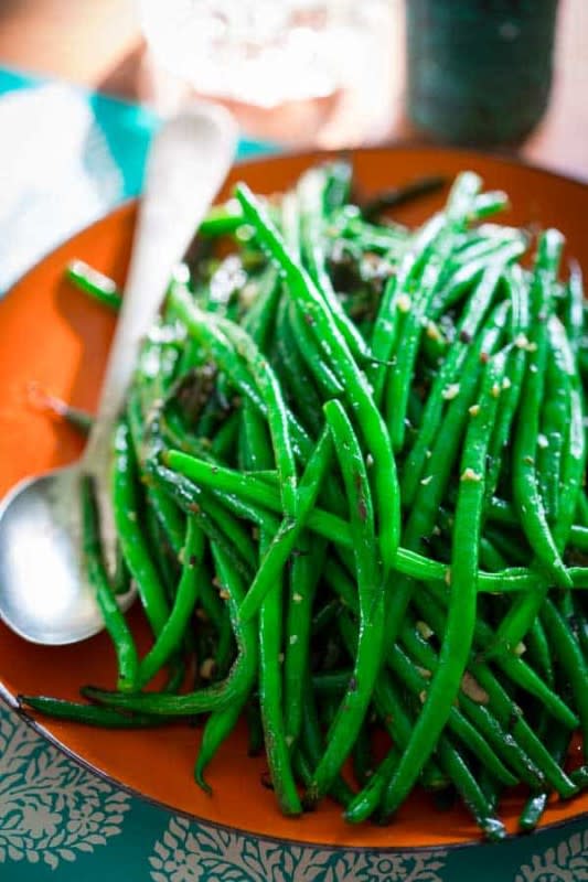 <p>Courtesy of healthyseasonalrecipes.com</p><p>These simple skillet green beans are a perfect healthy side dish. All you need is a pile of fresh string beans, one pot, garlic, olive oil and a little spice! </p><p><strong>Get the recipe: <a href="https://www.healthyseasonalrecipes.com/simple-skillet-green-beans/" rel="nofollow noopener" target="_blank" data-ylk="slk:Simple Skillet Green Beans;elm:context_link;itc:0;sec:content-canvas" class="link rapid-noclick-resp">Simple Skillet Green Beans</a></strong></p>