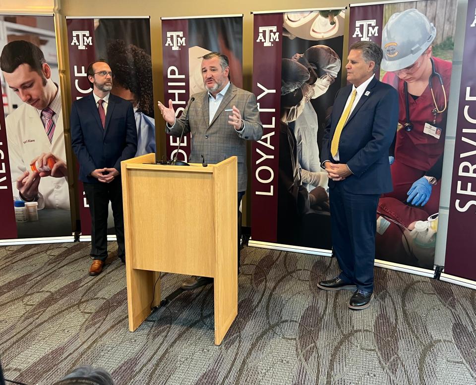 U.S. Sen. Ted Cruz speaks Thursday in Round Rock alongside Williamson County Judge Bill Gravell, right, and Dr. David Staack, director of the Texas A&M Semiconductor Institute, about legislation to increase U.S. semiconductor production.