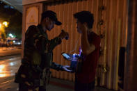 <p>Armed soldiers conduct spot inspections on the streets of Davao City, September 4, 2016. (Jes Aznar/Getty Images) </p>