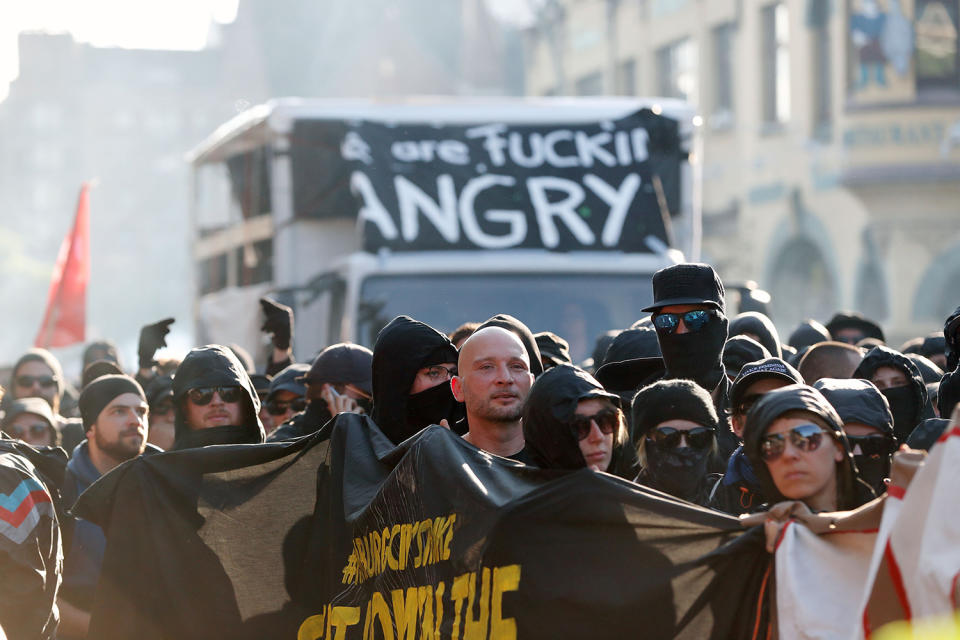 <p>Protesters march during the “Welcome to Hell” rally against the G-20 summit in Hamburg, northern Germany on July 6, 2017.<br> (Photo: Odd Andersen/AFP/Getty Images) </p>