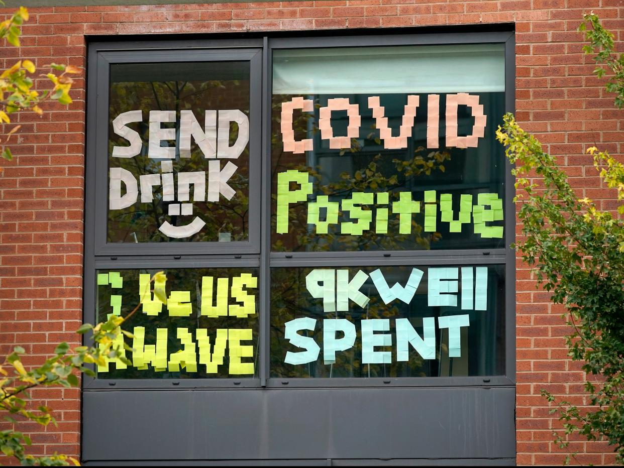 Student protest signs at Manchester Metropolitan University after 127 positive tests prompted a lockdown of two halls of residence (Getty Images)