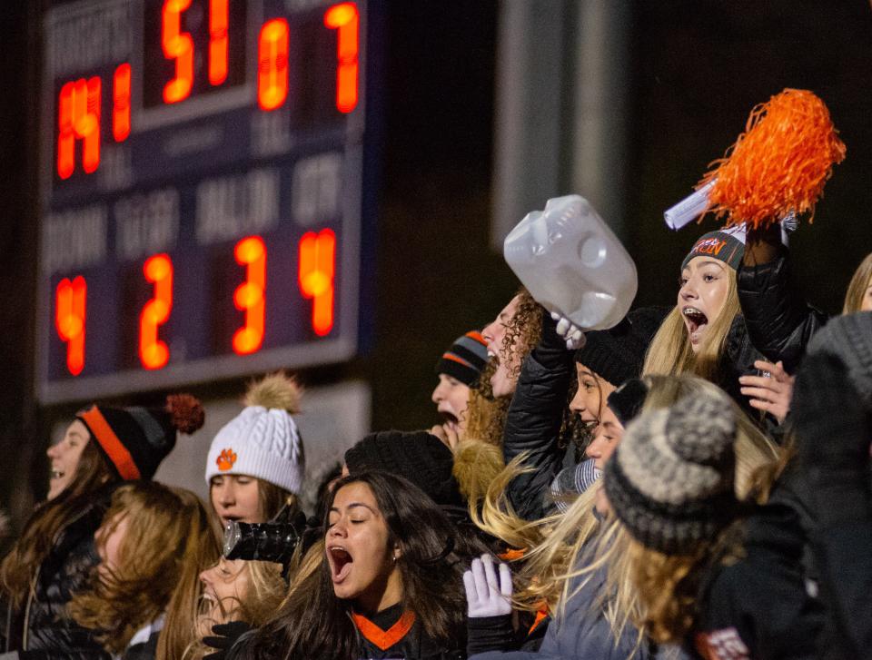 The Byron student section celebrates after Byron's first touchdown in the fourth quarter in Elmhurst on Saturday, Nov. 20, 2021. Byron beat IC Catholic 15-14 in the final five seconds of the Class 3A state semifinal game.