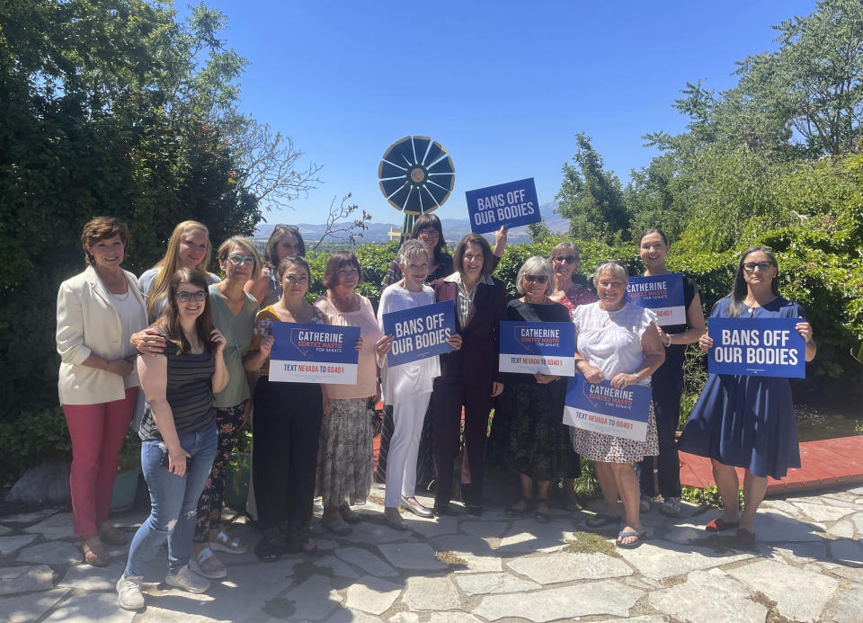 Nevada Sen. Catherine Cortez Mast is seen with supporters at a pro-choice event held in Sparks, Nev. on Thursday, July 7, 2022. (AP Photo/Gabe Stern)