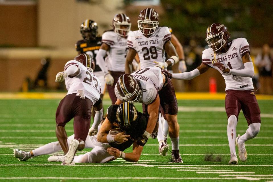 Texas State’s defense tackles during a game against Southern Miss at M.M. Roberts Stadium in Hattiesburg on Saturday, Sept. 30, 2023. Hannah Ruhoff/Sun Herald