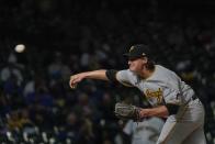 Pittsburgh Pirates' Kyle Crick throws during the eighth inning of a baseball game against the Milwaukee Brewers Sunday, April 18, 2021, in Milwaukee. (AP Photo/Morry Gash)