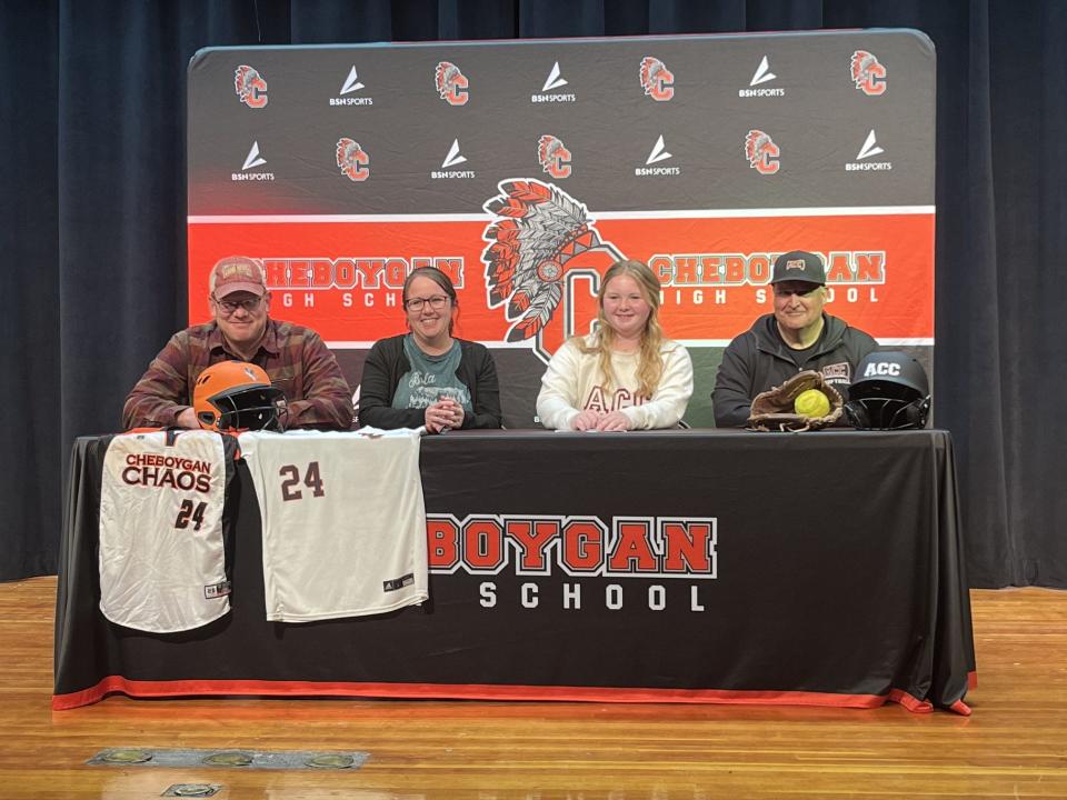 With parents, coaches, teammates and others present at Cheboygan's auditorium, Cheboygan senior Jordan Ashley signed to play softball at Alpena Community College on Tuesday.